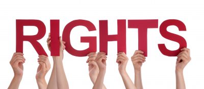 Many Caucasian People And Hands Holding Red Straight Letters Or Characters Building The Isolated English Word Rights On White Background